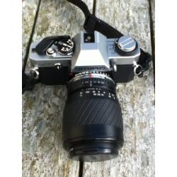 SLR Olympus film camera with 2 lenses and flash