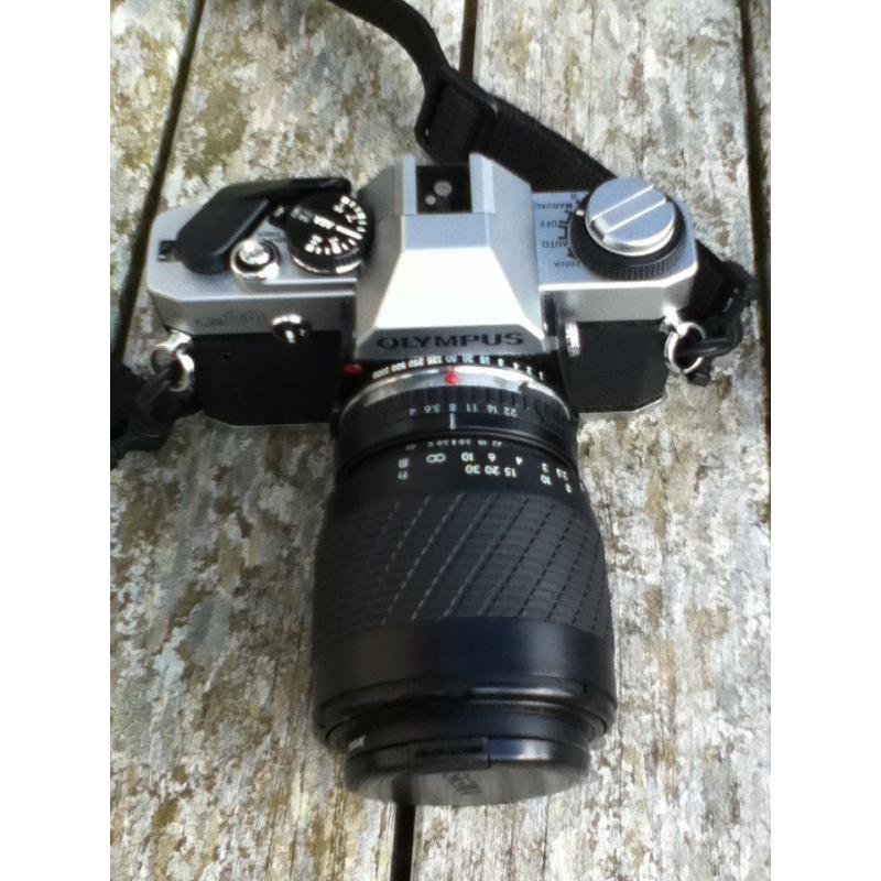 SLR Olympus film camera with 2 lenses and flash