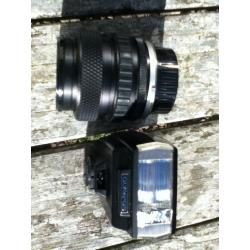 SLR Olympus film camera with 2 lenses and flash