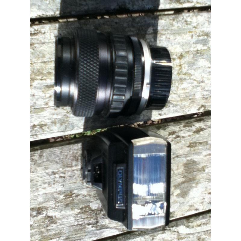 SLR Olympus film camera with 2 lenses and flash