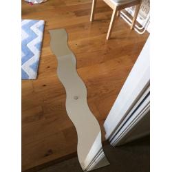 IKEA wave mirror. Slightly damaged corner