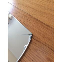 IKEA wave mirror. Slightly damaged corner