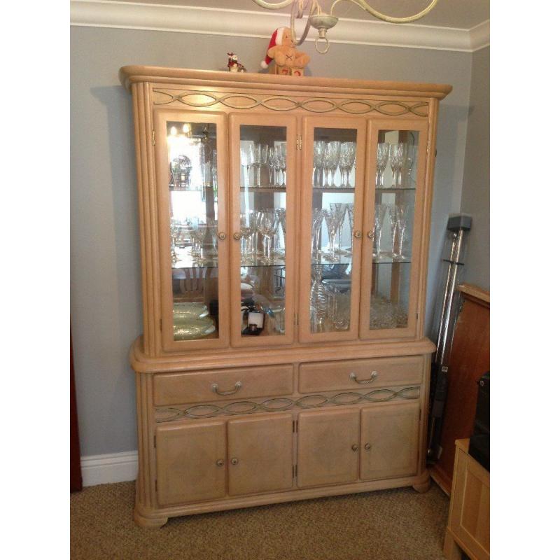 Limed oak dining table, 6 chairs, 2 carvers and large cabinet to match