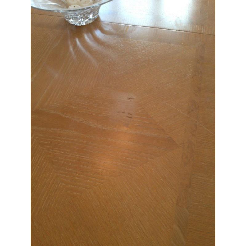 Limed oak dining table, 6 chairs, 2 carvers and large cabinet to match