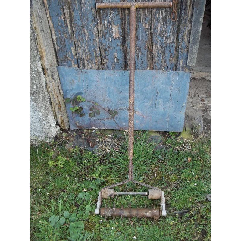 Antique garden lawn spiker