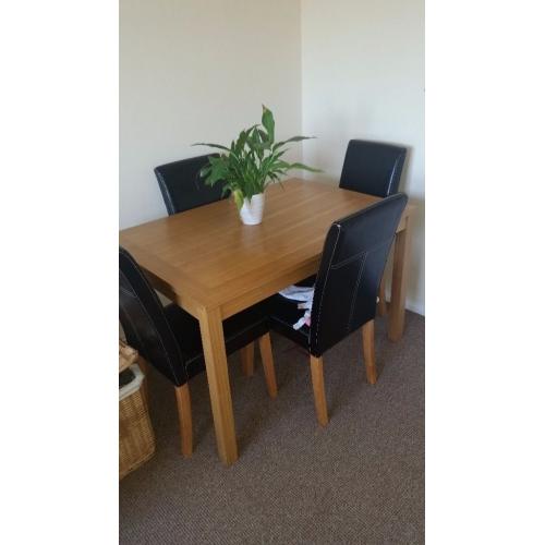 Good quality dining table and chairs