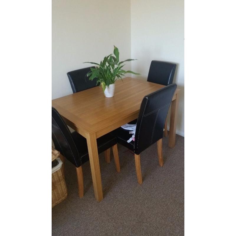 Good quality dining table and chairs