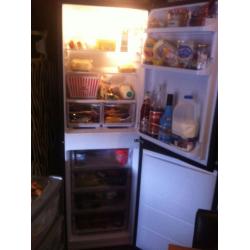 Indesit black fridge freezer 4 months old