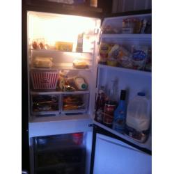 Indesit black fridge freezer 4 months old