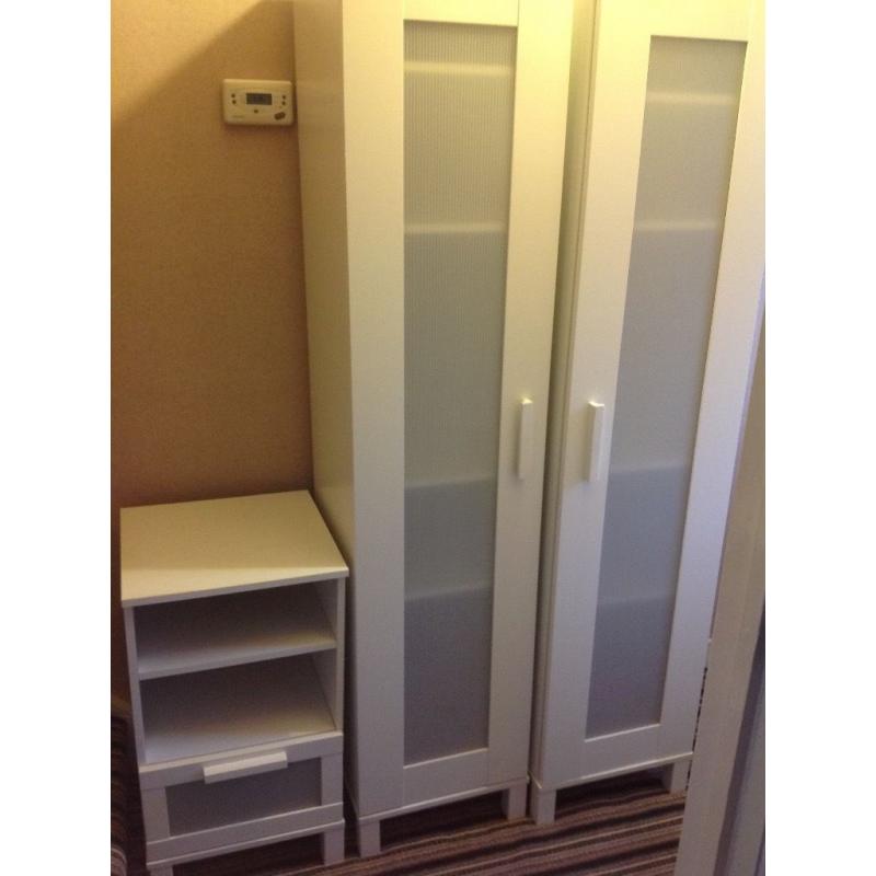 IKEA two white storage cupboards and bedside storage unit