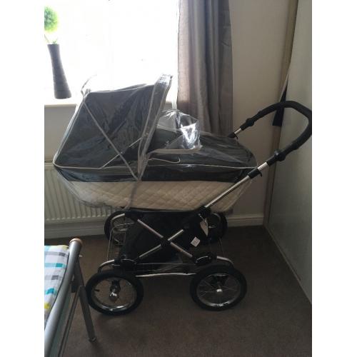 Silver cross pram with rain cover and foot muff