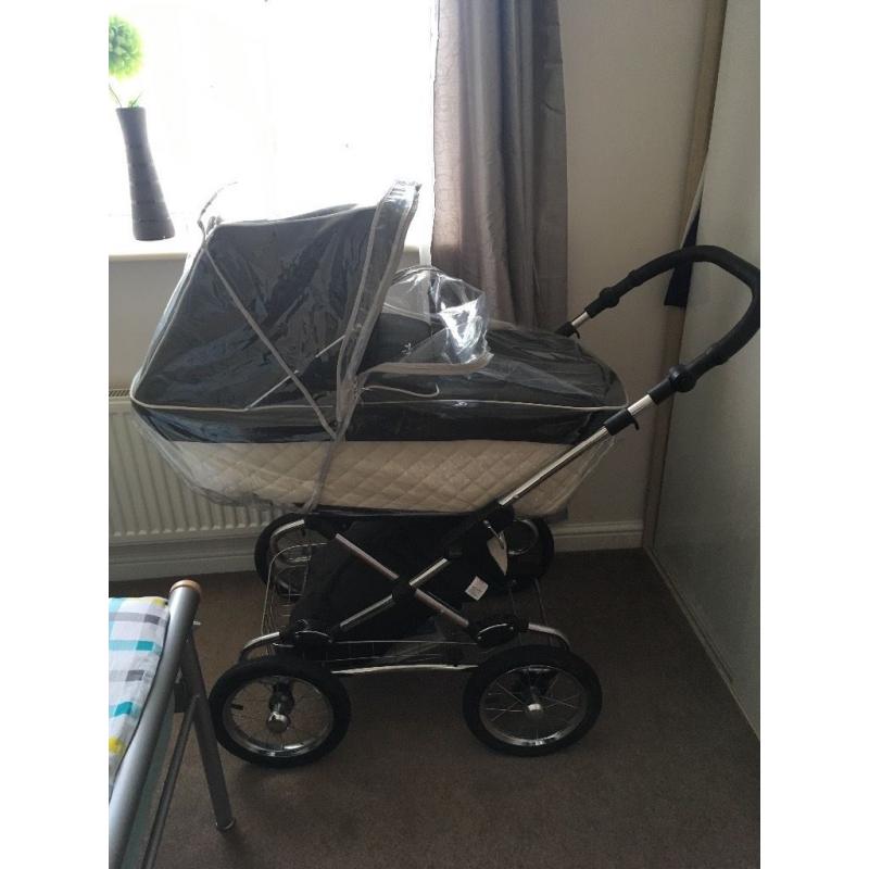 Silver cross pram with rain cover and foot muff