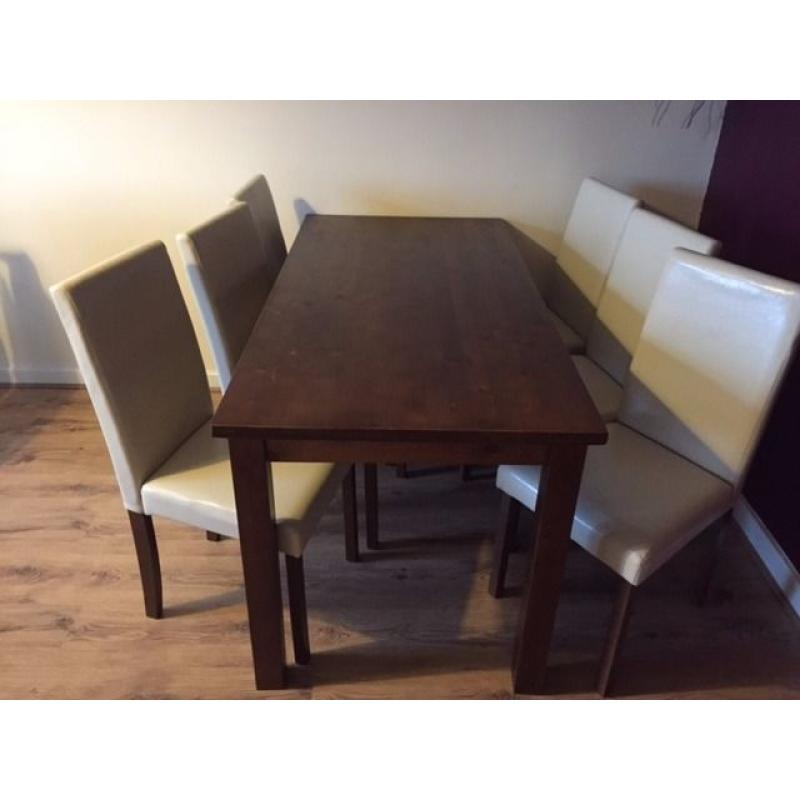 Big dining table with 6 Faux leather chairs