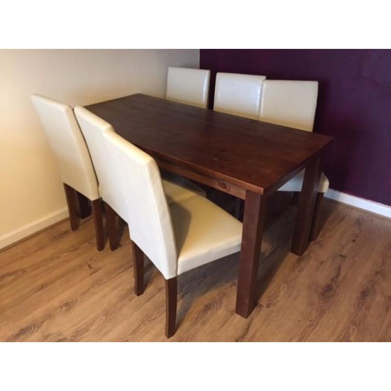 Big dining table with 6 Faux leather chairs