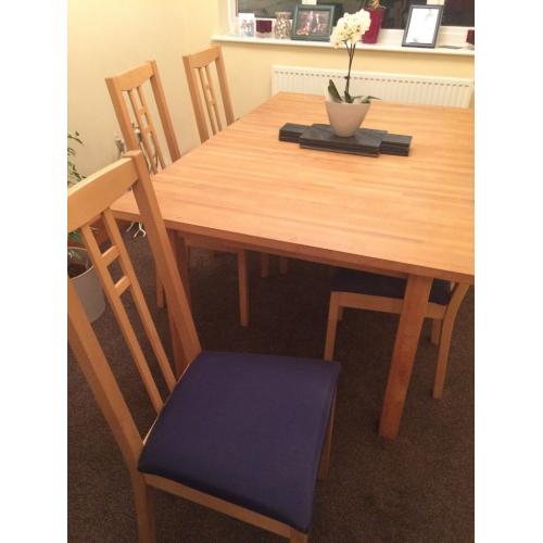 Extendable Solid Wood Dining Table and 8 matching chairs