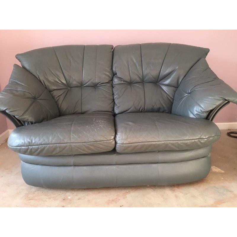 2 X Two leather teal/grey 2 seater sofas. Good condition. 150 Ono