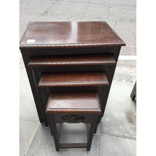 Nest of 4 Oriental tables , lovely carved detail , good condition. Must be seen.
