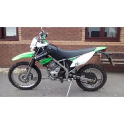 KAWASAKI KLX125. MATURE LADY OWNER LOW MILEAGE. FULL SERVICE HISTORY