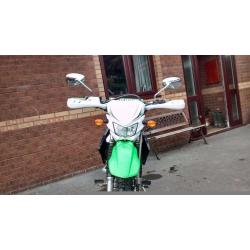 KAWASAKI KLX125. MATURE LADY OWNER LOW MILEAGE. FULL SERVICE HISTORY