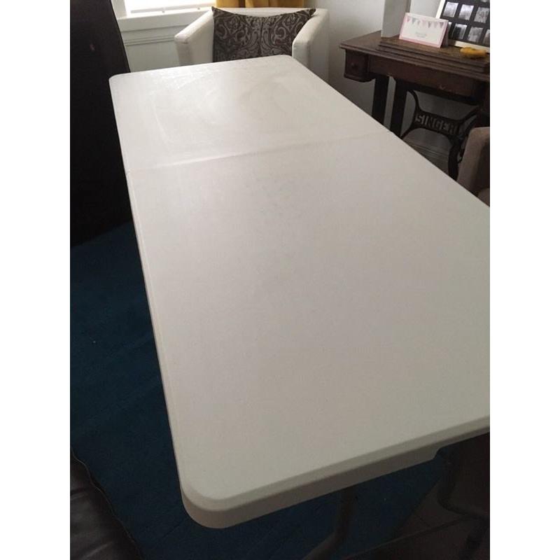 Foldable moulded plastic table & four chairs