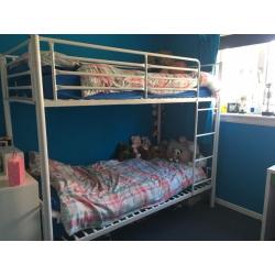 White metal bunk bed frame