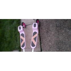 Pink and white scooter