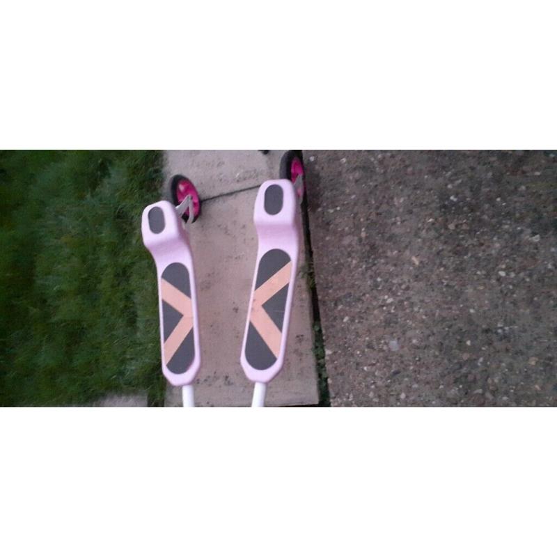 Pink and white scooter