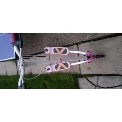 Pink and white scooter