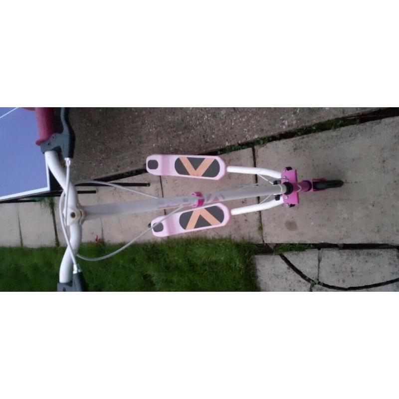 Pink and white scooter