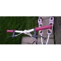 Pink and white scooter
