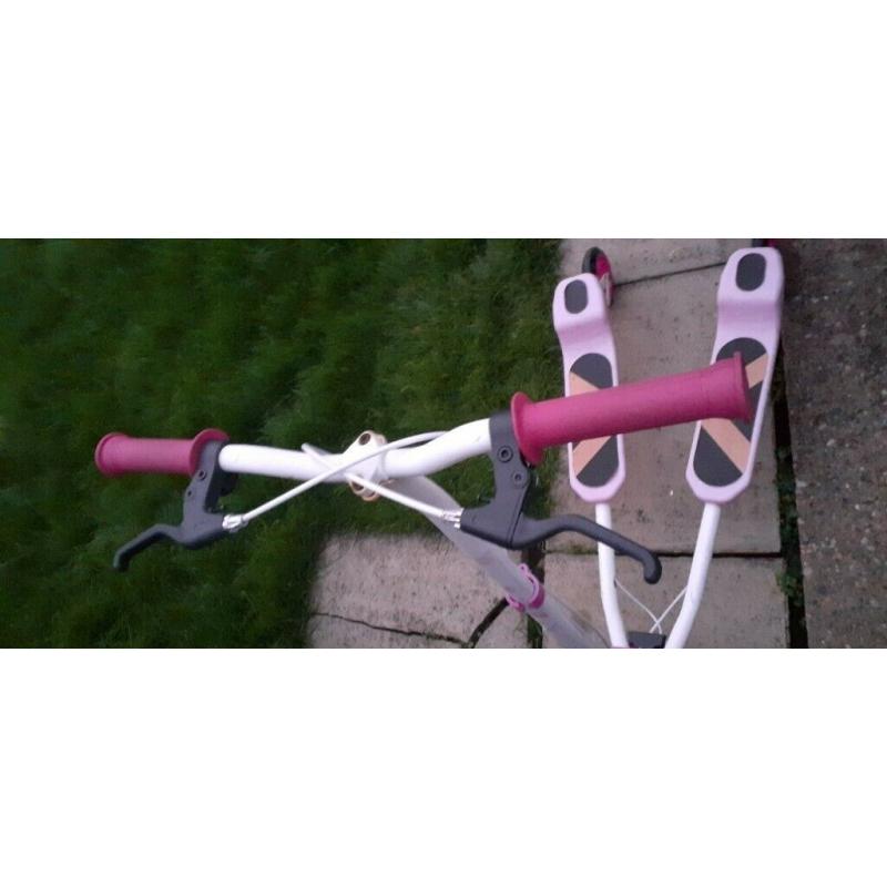 Pink and white scooter