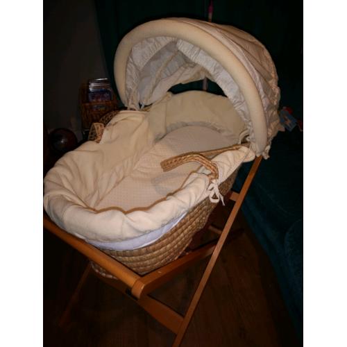 Mammas and Papas moses basket.