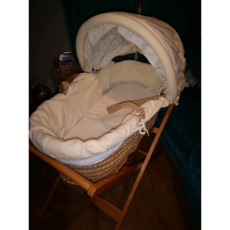 Mammas and Papas moses basket.