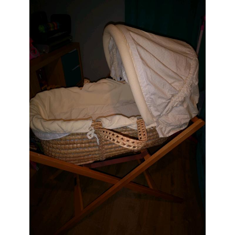 Mammas and Papas moses basket.