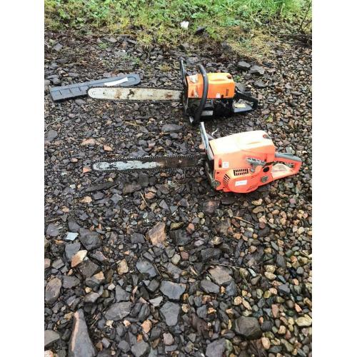 Chainsaws.