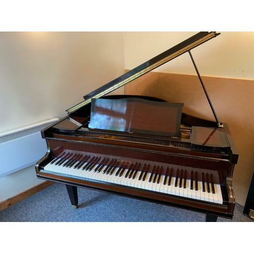 Beautiful baby grand piano