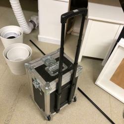 Flight case on wheels with handle