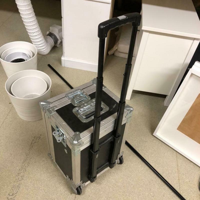 Flight case on wheels with handle