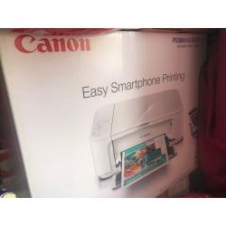 brand new wireless Canon printer, with free printing paper and notebooks