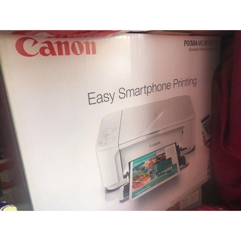 brand new wireless Canon printer, with free printing paper and notebooks