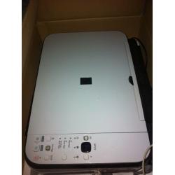 brand new wireless Canon printer, with free printing paper and notebooks