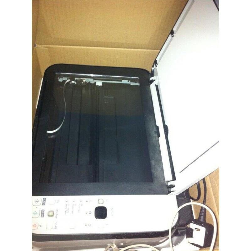 brand new wireless Canon printer, with free printing paper and notebooks