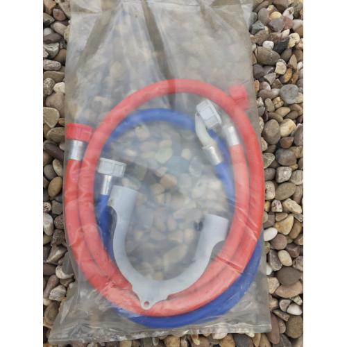 Unused pair of washing machine hoses