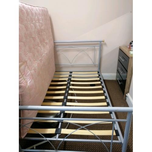 Bed with a mattress