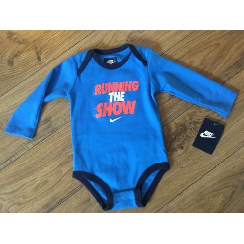 Brand New Nike Baby 9-12 months long sleeve bodysuit blue ?running the show?