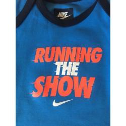 Brand New Nike Baby 9-12 months long sleeve bodysuit blue ?running the show?