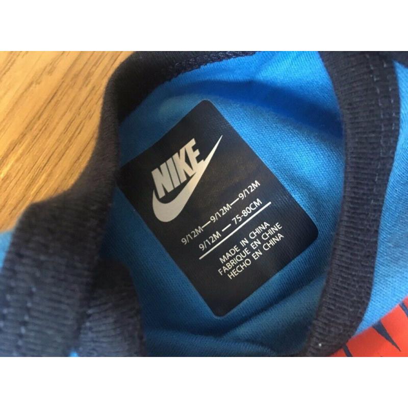 Brand New Nike Baby 9-12 months long sleeve bodysuit blue ?running the show?