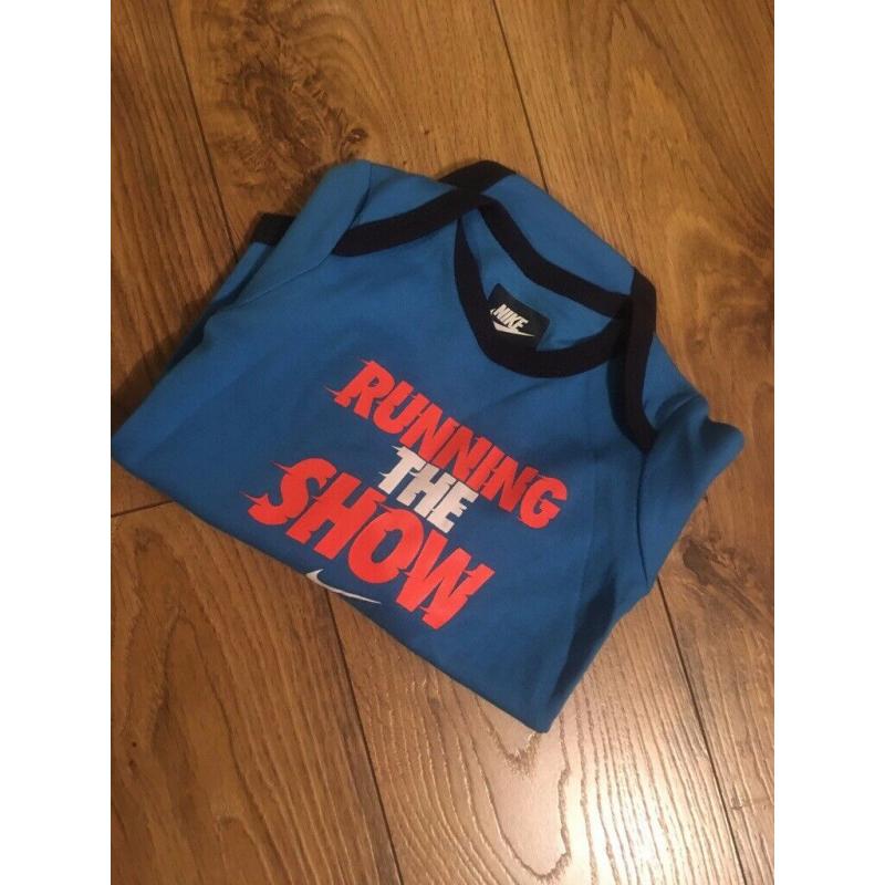 Brand New Nike Baby 9-12 months long sleeve bodysuit blue ?running the show?