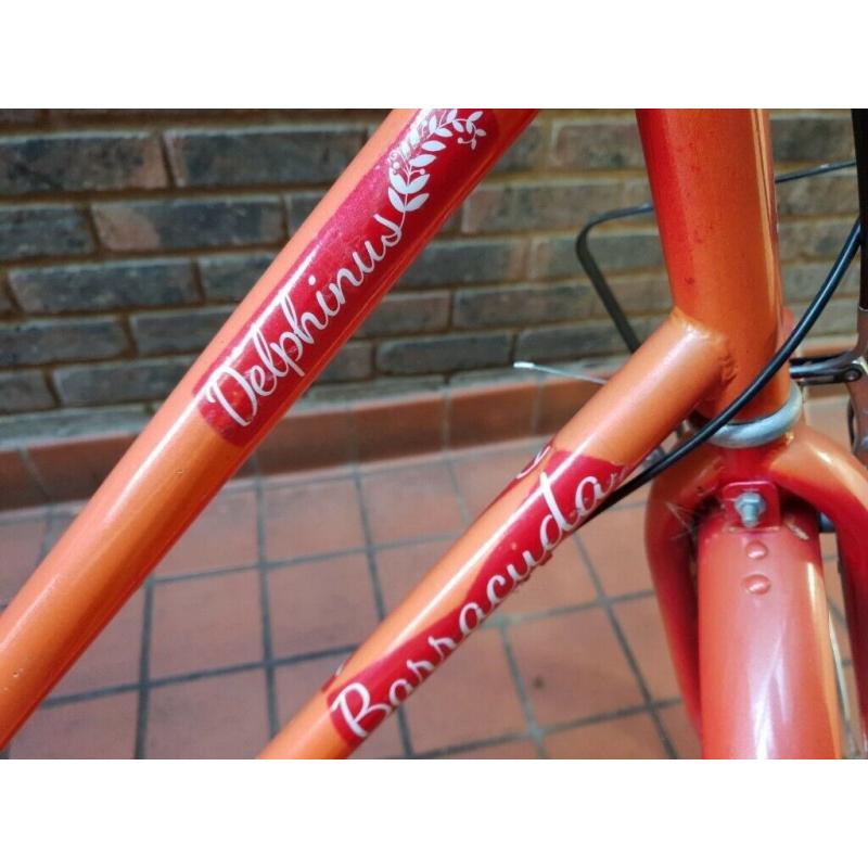 Barracuda Delphinus Hybrid Town Bicycle In Orange. With Front Wicker Basket