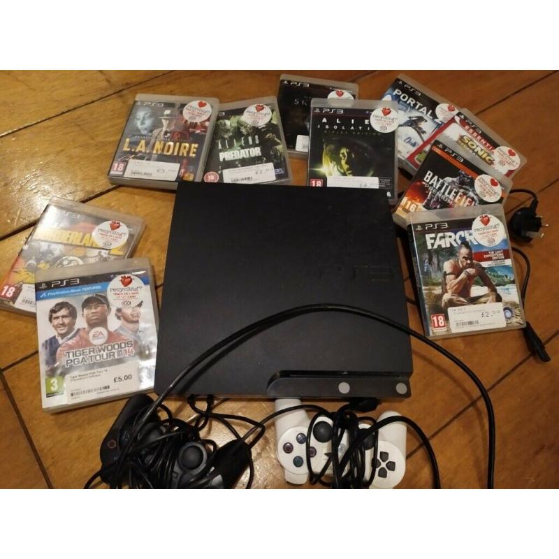 Sony Playstation 3, two controllers and games